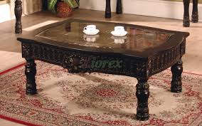 This table is best for smaller living rooms because of its round shape. Ajax Rectangle Coffee Table With Faux Marble Top Inlay Xiorex
