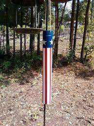 Squirrel Baffle Made From A Piece Of Heating Duct A Little Paint And Some Twine To Hang It Up With Squirrel Baffle Bird Feeder Craft Squirrel Baffle Diy