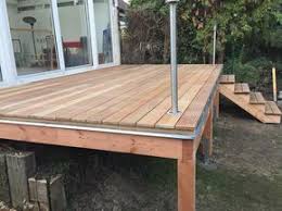 Erhohte Terrasse Aus Bangkirai Mit Holztreppe Und Aussentreppe Erhohte Terrasse Terrasse Holz Bangkirai Terrasse