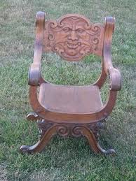 I Have An Antique Hand Carved Wood Chair With A Face On It The Wood Chair Chair Carved Chairs