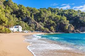 Barcelona, spain is a place to enjoy breathtaking views, delicious food, and some of the best beaches. Beach Day Hidden Beaches In And Around Barcelona Barcelona Beach Barcelona Spain Beaches Hidden Beach