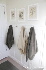 After Nailing The Slats To The Wall I Cover All The Nail Holes With Spackle Let Dry And Sand It Took Bathroom Towel Hooks Bathroom Towels Girls Bathroom