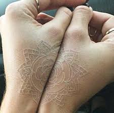 Under normal lighting conditions, oya's delicate blackwork lines result in an impressive style; Pros Cons Of White Ink Tattoos Example Images Authoritytattoo