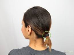 Make sure that your ponytail is level with the tips of your ears. How To Make A Bun For Short Hair Short Hair Bun Short Hair Ponytail Messy Bun For Short Hair