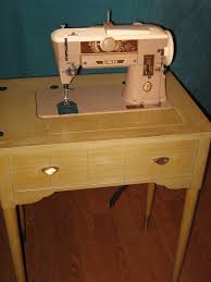Vintage sewing pattern cabinet for sale. A Surprise Singer 401a Grow Your Own Clothes