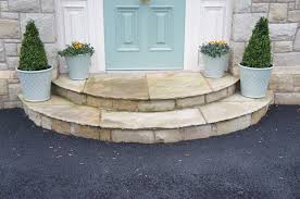 Photo about curved front steps leading up to front door under curved portico porch roof with round tapered fluted columns. Steps Formed From Tinted Mint Paving Coolestone Stone Importers Suppliers Masonry Tyrone Northern Ireland
