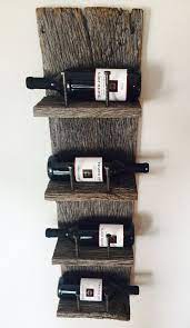 Due to the nature of reclaimed wood no piece is exactly alike, variations such as cracks, knots, etc add to the piece's character. Reclaimed Wood Industrial Wine Rack Reclaimed Wood Wine Rack Wood Wine Racks Industrial Wine Racks