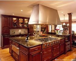 Dark Cherry Cabinets Stainless Steel Appliances Hardwood Floors And Granite Counter Tops Yes Emmieren Tuscan Kitchen Design Tuscan Kitchen Tuscany Kitchen