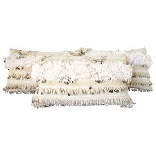 The lustrous subtlety of the beaded circles on this pillow brings depth and tonal richness to your space. Moroccan White Tribal Pillows With Silver Sequins And Long Fringes For Sale At 1stdibs