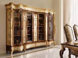 Depending on your needs and taste, you may choose from our wide range of dining room tables covered with glass tops, laminated wood or ornated with smooth and durable granite. Classic Wood Dining Room Handmade Luxury Furniture