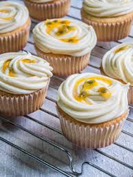 The combination of sponge cake layeres with a rich cream and coconut shavings is amazing! Gluten Free Passion Fruit Cupcakes With Cream Cheese Frosting