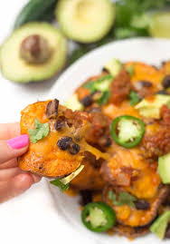 These healthy loaded potato nachos with black beans, cheese, salsa and spinach are a total family dinner hit. Incredible Loaded Sweet Potato Nachos Healthy Liv