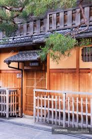 It bringing the old charms to the advent of new architecture. Traditional Wooden Japanese House On Street Of Kyoto Japan Sidewalk Facade Stock Photo 258966642