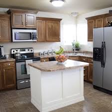 Staining builder grade oak cabinets. How To Refinish Wood Cabinets The Easy Way Love Remodeled
