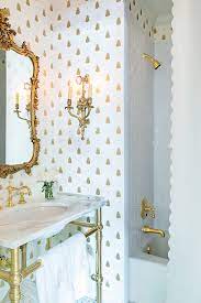 A light wallpaper like in this bathroom designed by studio db keeps things feeling sweet and airy. White And Gold Bathroom Ideas Contemporary Bathroom