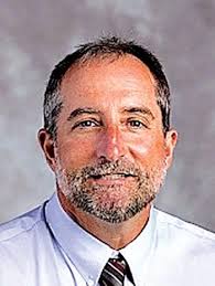 Erath head football coach has broken foot, concussion