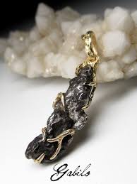 When the entire meteorite is mined, it gives a total of 8 magnetite. Meteorite Pendant Gold Natural Raw Meteorite Necklace Black Etsy