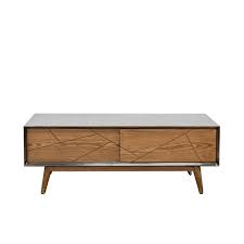This coffee table offers a glass mirrored top and a solid iron frame with an antique gold finish. Keya Antique Brass Coffee Table Palette Design