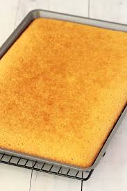 This thin cake is blanketed with a warm, pourable frosting and topped with pecans. Vegan Vanilla Sheet Cake Loving It Vegan