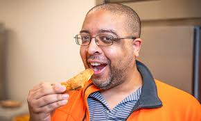 Beyond Business: Perry doubles as academic advisor, chef