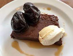 It is the largest island of a small, circular archipelago, which bears the same name and is the remnant of a volcanic caldera. The Dark Chocolate Terrine And Brandied Prunes Superb Ending To The Meal Picture Of St John Bread And Wine London Tripadvisor