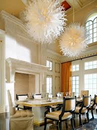 end dining room with chandelier art
