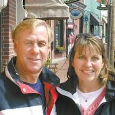 Marathon runner, companion pound pavement in Portsmouth