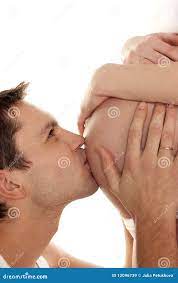 Dad kissing wife s belly stock image. Image of kissing - 12096739