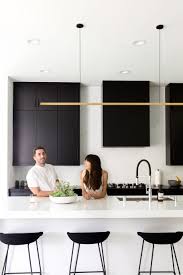 Black And White House Interior Kitchen A Monochrome Minimalist Masterpiece In Culver City Apartment Decorating Black White Modern Kitchen White Apartment