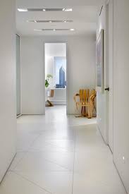 Compare cost, maintenance, design and practicality of today's most popular choices. Modern White Hallway With Triangular Tile Floor Tile Floor White Tile Floor Flooring