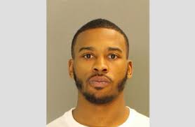 Judge views video of fatal beating, holds suspect for court