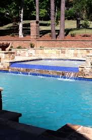 Swimming pool waterfalls (design ideas) here's our guide to swimming pool waterfalls showcasing custom designs and ideas for your home's backyard. 41 Swimming Pool Waterfall Ideas Sebring Design Build