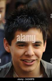 American Idol contestant David Archuleta, right, and his father, Jeff  Archuleta, smile before a performance at David's high school, Friday, May  9, 2008, in Murray, Utah. (AP Photo/Kenny Crookston Stock Photo