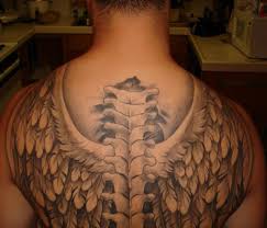 The chest area provides artists more space to use, so you can add more elements and symbols to your tattoo. Wings Tattoo Designs For Men Upper Back Cross Mens Tattoo Wing Tattoo Men Back Tattoos For Guys Angel Wings Tattoo