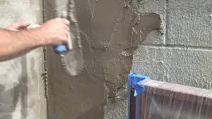 To apply to a brick, block or concrete wall you need to Stucco Application On Wall Stock Footage Video Of Cinder 43644736