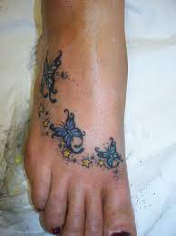 Butterfly On The Foot Butterfly Foot Tattoo Foot Tattoos Butterfly Tattoo Designs