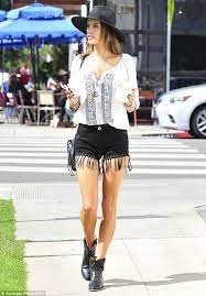 Alessandra Ambrosio Wears Shorts With Fringes And A Cowboy Hat In La Cowgirl Boots Outfit Summer Fashion How To Wear