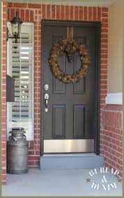 Their rustic looks and traditional that is to say that you shouldn't choose a pink door for a red brick house. New Black Front Door And Deco Garden Design Exterior Door Colors Painted Front Doors Red Brick House Exterior
