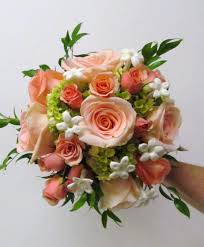This reverse sheaf style bouquet featured lush peonies and peach, pale pink and cream 58. Coral Wedding Bouquet Buffalo Wedding Event Flowers By Lipinoga Florist