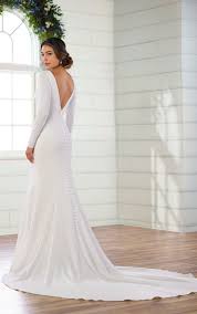 Sometimes simple designs are the most divine, and a silk wedding dress is no exception. Simple And Sleek Long Sleeved Sheath Wedding Dress Sleek Wedding Dress Winter Wedding Dress Christmas Wedding Dresses