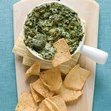 Spinach dip stuffed crescent roll christmas tree real. Christmas Tree Spinach Dip Breadsticks Recipe Southern Living