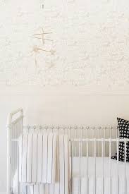 And after one peek at fleur de sel 's sweet as can be safari nursery you'll probably be squealing alongside me. Gender Neutral Nursery With Safari Print Wallpaper Transitional Nursery