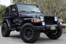 Image result for Brilliant Black 2004 Jeep