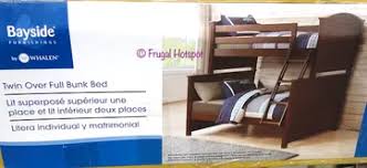 There is a lower bunk or tier and another bunk mounted above it to make another tier. Costco Sale Bayside Furnishings Twin Over Full Bunk Bed 449 99
