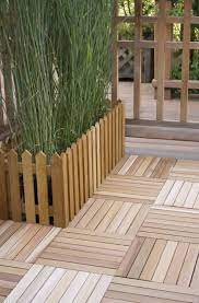 Deck Tiles An Easy And Inexpensive Diy Option Deck Over Concrete Concrete Patio Makeover Deck Tiles