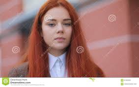 Showing all images tagged female, solo, blue eyes and brown hair. Red Haired Fox Girl With Deep Blue Eyes In Brown Jacket And White T Shirt Looking Into The Camera And Smiling With Stock Video Video Of Female Beautiful 91932937
