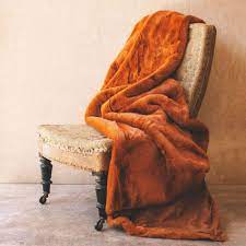 Throw blankets are used to add additional style, color and texture to your bed look. Burnt Amber Throw Graham Green