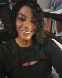 My adorable niece at twelve months old signing with me.