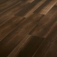 In what rooms are high gloss floor tiles most impressive? High Gloss Brown Grey High Gloss Wood Effect Ceramic Wall Floor Tile Pack Of 7 L 900mm W 150mm Diy At B Q