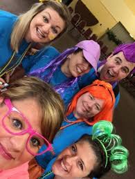 FHS Principal Kim Cerrini, Assistant Principal Rebecca Akins and teachers  Katie VanGorder, Lauren Wohlfert, Lindsey Paas and Brian Michael prepare to  register students at the Michigan Associations of Student Councils and Honor